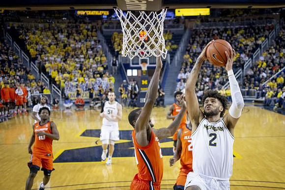 Isaiah Livers (2), Austin Davis (51), and Zavier Simpson (3)