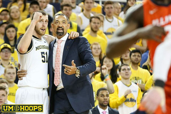 Austin Davis (51) and Juwan Howard