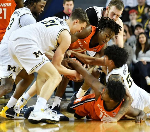 Zavier Simpson (3), Franz Wagner (21), Austin Davis (51), and Eli Brooks (55)