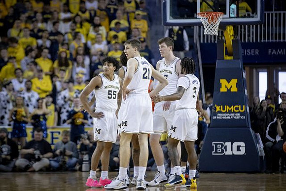 Eli Brooks (55), Franz Wagner (21), Jon Teske (15), and Zavier Simpson (3)