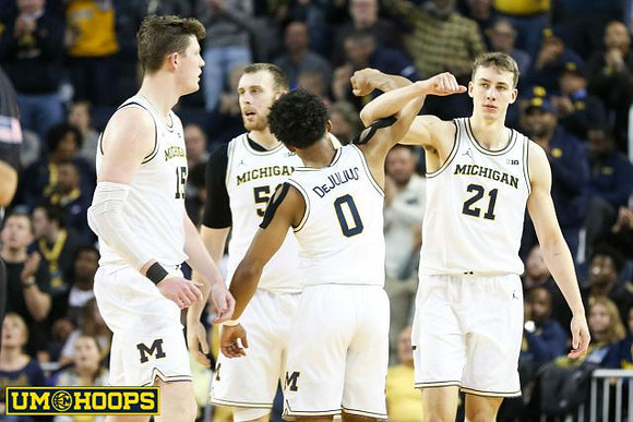 Jon Teske (15), Austin Davis (51), David DeJulius (0), and Franz Wagner (21)