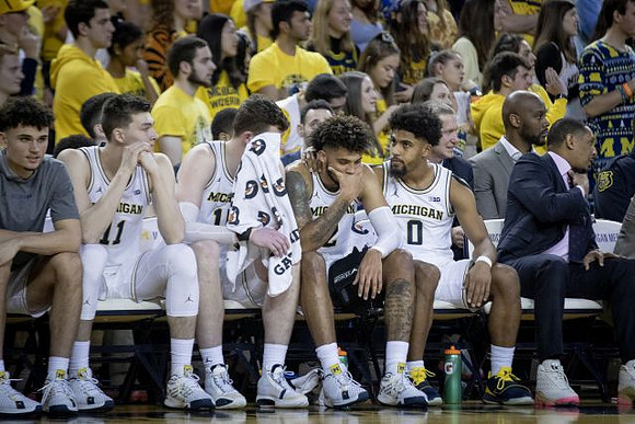 Adrien Nunez (5), Colin Castleton (11), Jon Teske (15), Isaiah Livers (2), David DeJulius (0), and Howard Eisley