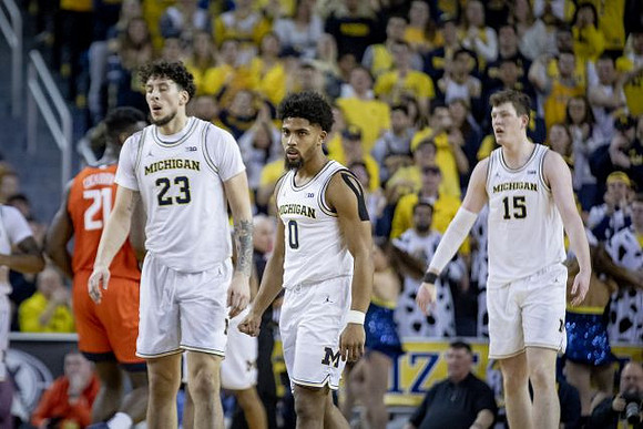 Brandon Johns Jr. (23), David DeJulius (0), and Jon Teske (15)
