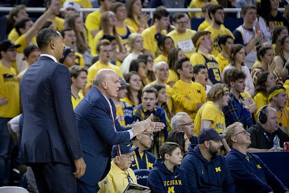 Juwan Howard and Phil Martelli