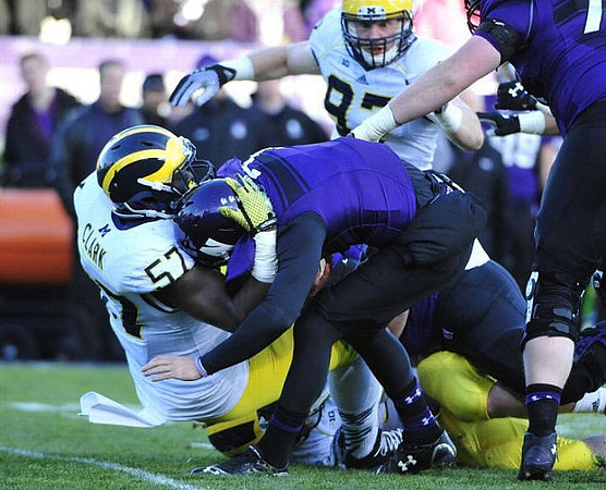 Frank Clark (57) and Brennen Beyer (97)