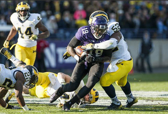 Delano Hill (44), Jarrod Wilson (22), and Royce Jenkins-Stone (52)