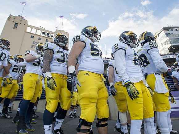 Drake Johnson (20), Taco Charlton (33), Sione Houma (39), Ondre Pipkins (56), Blake Countess (2), and Devin Gardner (98)