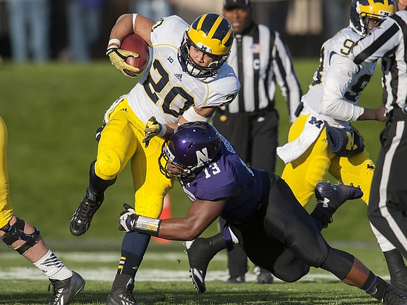 Drake Johnson (20) and Devin Gardner (98)
