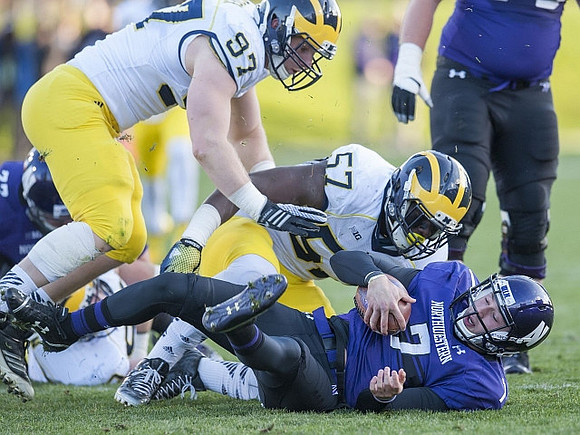 Brennen Beyer (97) and Frank Clark (57)