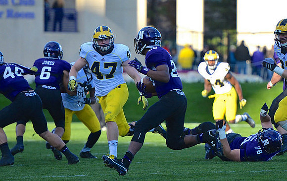 Jake Ryan (47) and Delano Hill (44)