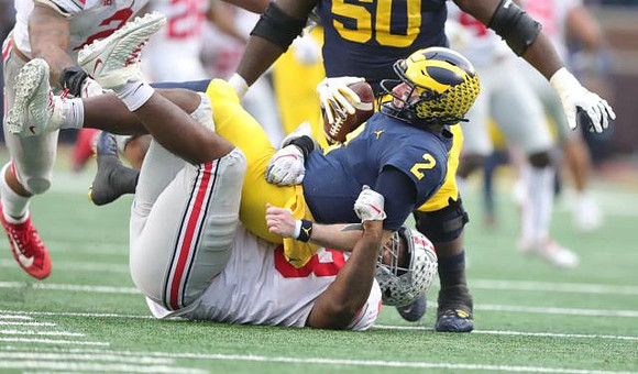 Michael Onwenu (50) and Shea Patterson (2)