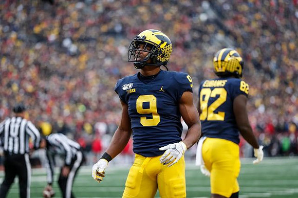 Donovan Peoples-Jones (9) and Nick Eubanks (82)