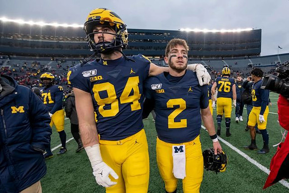 Sean McKeon (84) and Shea Patterson (2)