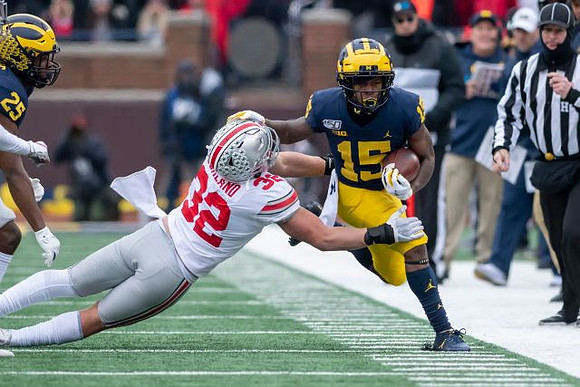 Hassan Haskins (25) and Giles Jackson (15)