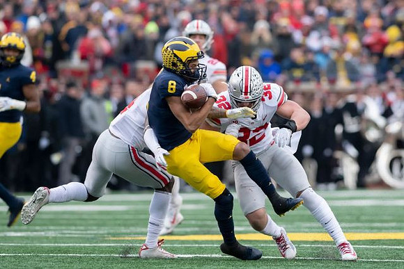 Nico Collins (4) and Ronnie Bell (8)