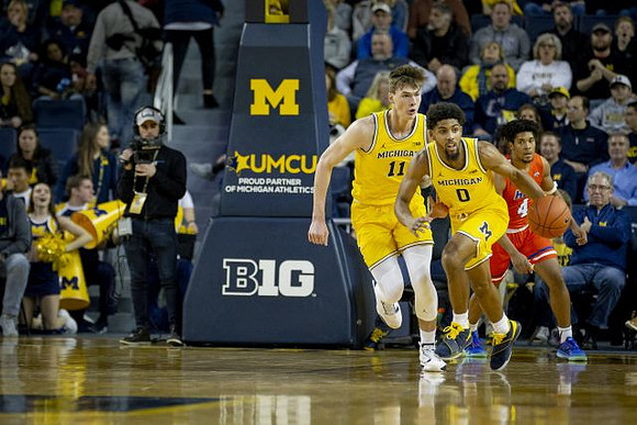 Colin Castleton (11) and David DeJulius (0)