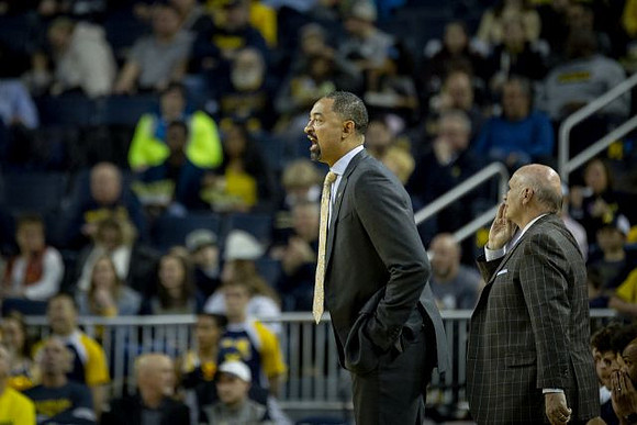 Juwan Howard and Phil Martelli