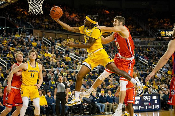 Colin Castleton (11) and Zavier Simpson (3)