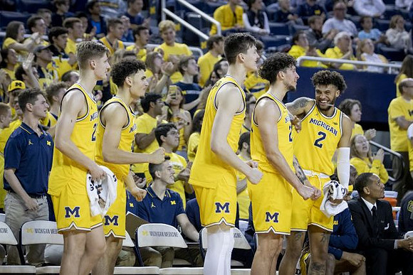Cole Bajema (22), Adrien Nunez (5), Colin Castleton (11), Brandon Johns Jr. (23), and Isaiah Livers (2)