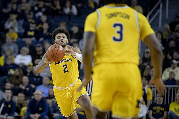 Isaiah Livers (2) and Zavier Simpson (3)