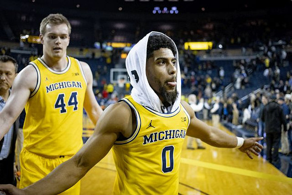 Jaron Faulds (44) and David DeJulius (0)