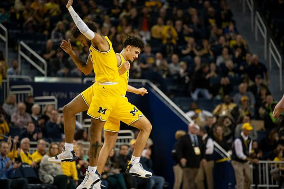 Isaiah Livers (2) and Adrien Nunez (5)