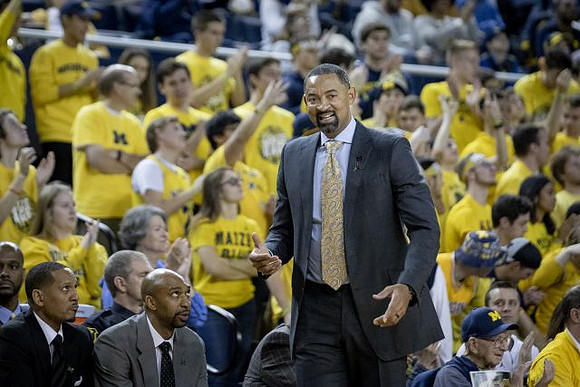Howard Eisley, Saddi Washington, and Juwan Howard