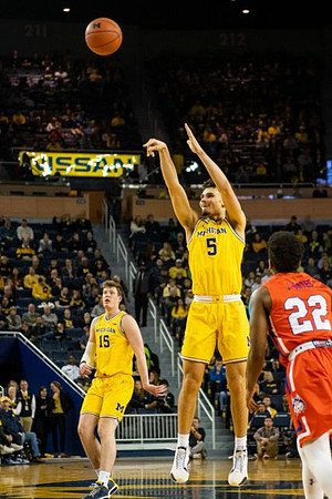 Jon Teske (15) and Adrien Nunez (5)