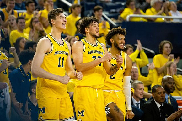 Colin Castleton (11), Brandon Johns Jr. (23), Isaiah Livers (2), and Howard Eisley