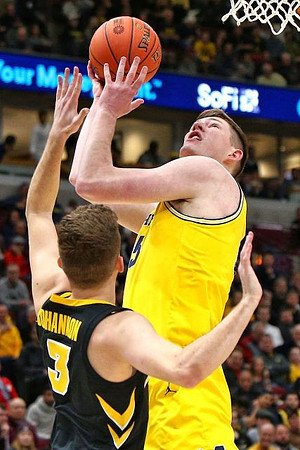 Ignas Brazdeikis (13) and Jon Teske (15)