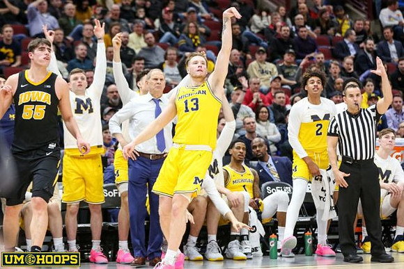 Ignas Brazdeikis (13) and Zavier Simpson (3)
