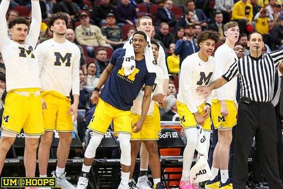 Zavier Simpson (3) and Ignas Brazdeikis (13)