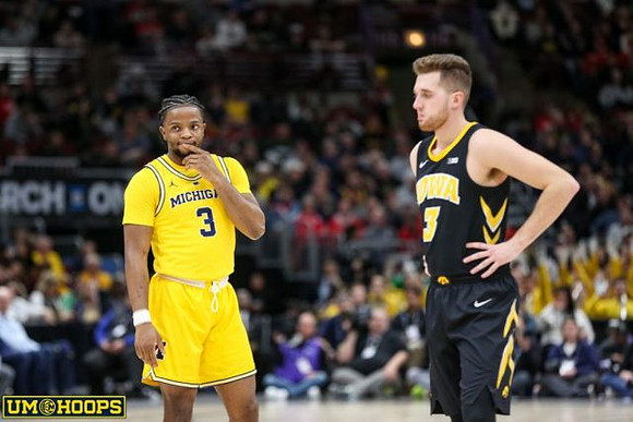 Charles Matthews (1) and Jordan Poole (2)
