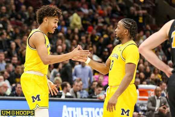Charles Matthews (1), Jon Teske (15), Ignas Brazdeikis (13), and Jordan Poole (2)