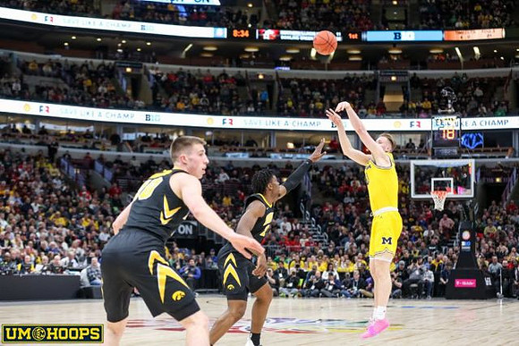 Charles Matthews (1), Jon Teske (15), Jordan Poole (2), Ignas Brazdeikis (13), and Zavier Simpson (3)