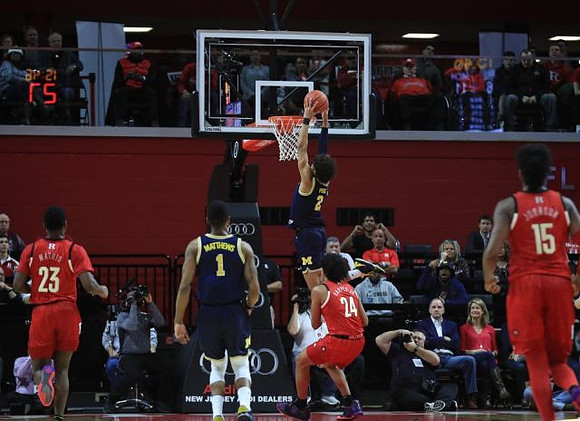 Charles Matthews (1) and Jordan Poole (2)