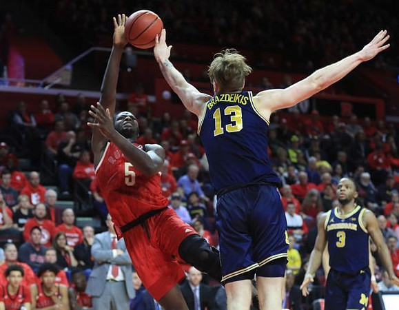 Ignas Brazdeikis (13) and Zavier Simpson (3)