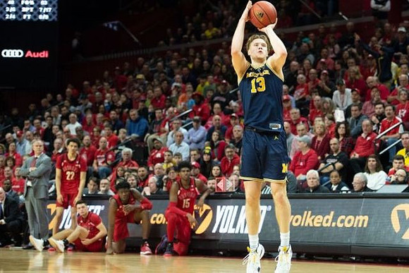 Ignas Brazdeikis (13) and Rutgers Head Coach Steve Pikiell
