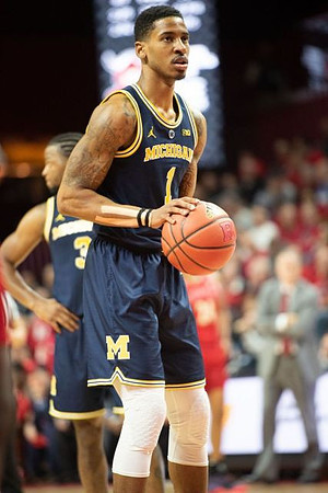 Charles Matthews (1) and Zavier Simpson (3)