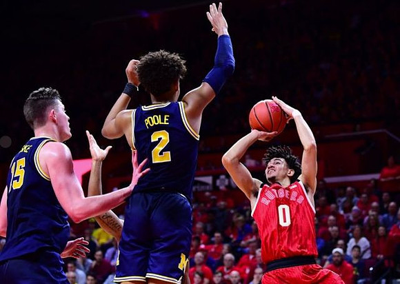 Jon Teske (15) and Jordan Poole (2)