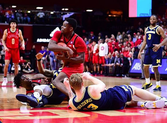 Charles Matthews (1), Ignas Brazdeikis (13), and Zavier Simpson (3)