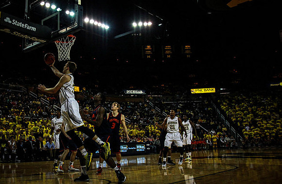 Mark Donnal (34), Kameron Chatman (3), Zak Irvin (21), and Caris LeVert (23)