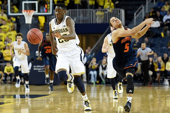 Caris LeVert (23) and D.J. Wilson (5)