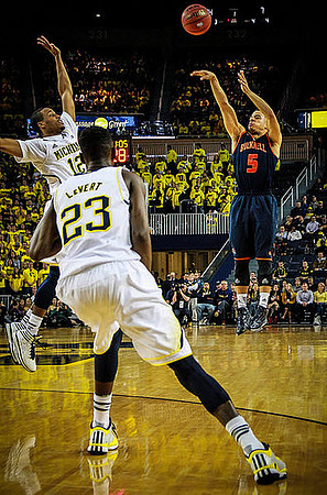 Caris LeVert (23) and Muhammad-Ali Abdur-Rahkman (12)