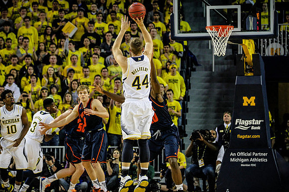 Derrick Walton Jr. (10), Kameron Chatman (3), and Max Bielfeldt (44)
