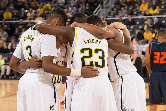 Kameron Chatman (3) and Caris LeVert (23)