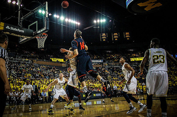 Muhammad-Ali Abdur-Rahkman (12), Ricky Doyle (32), Zak Irvin (21), and Caris LeVert (23)