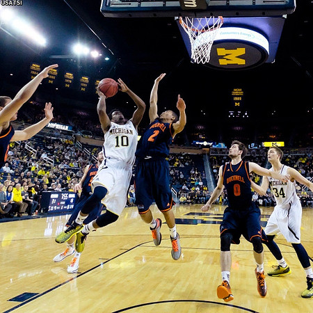 Derrick Walton Jr. (10) and Mark Donnal (34)