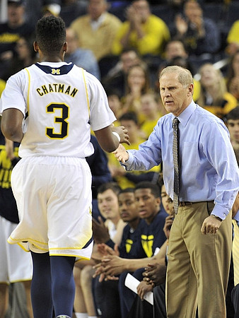 Kameron Chatman (3) and John Beilein