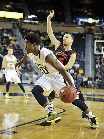 Derrick Walton Jr. (10) and Spike Albrecht (2)
